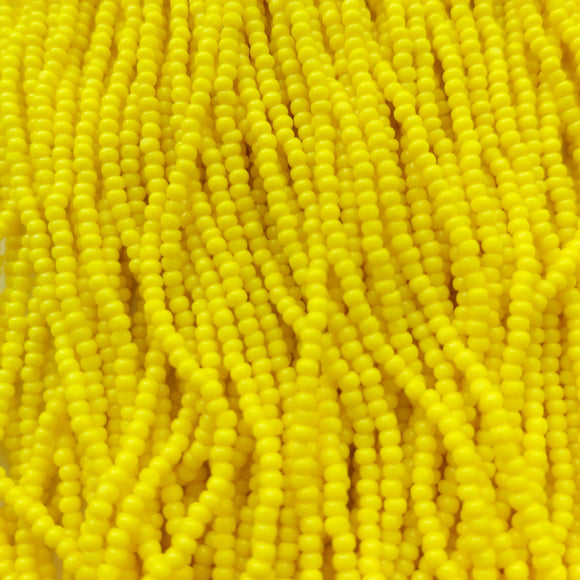 Charlottes 11/0 Opaque Lemon Yellow - Cut Czech Seed Bead
